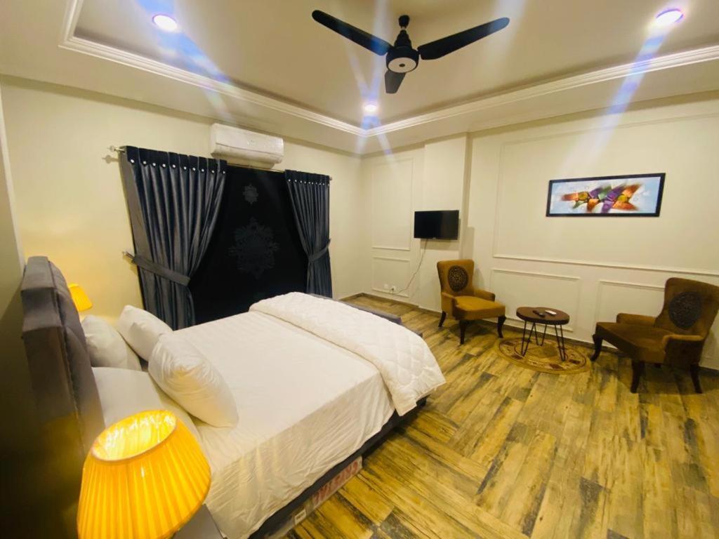 Holidazzle Serviced Apartments Bahria Town ラーワルピンディー エクステリア 写真