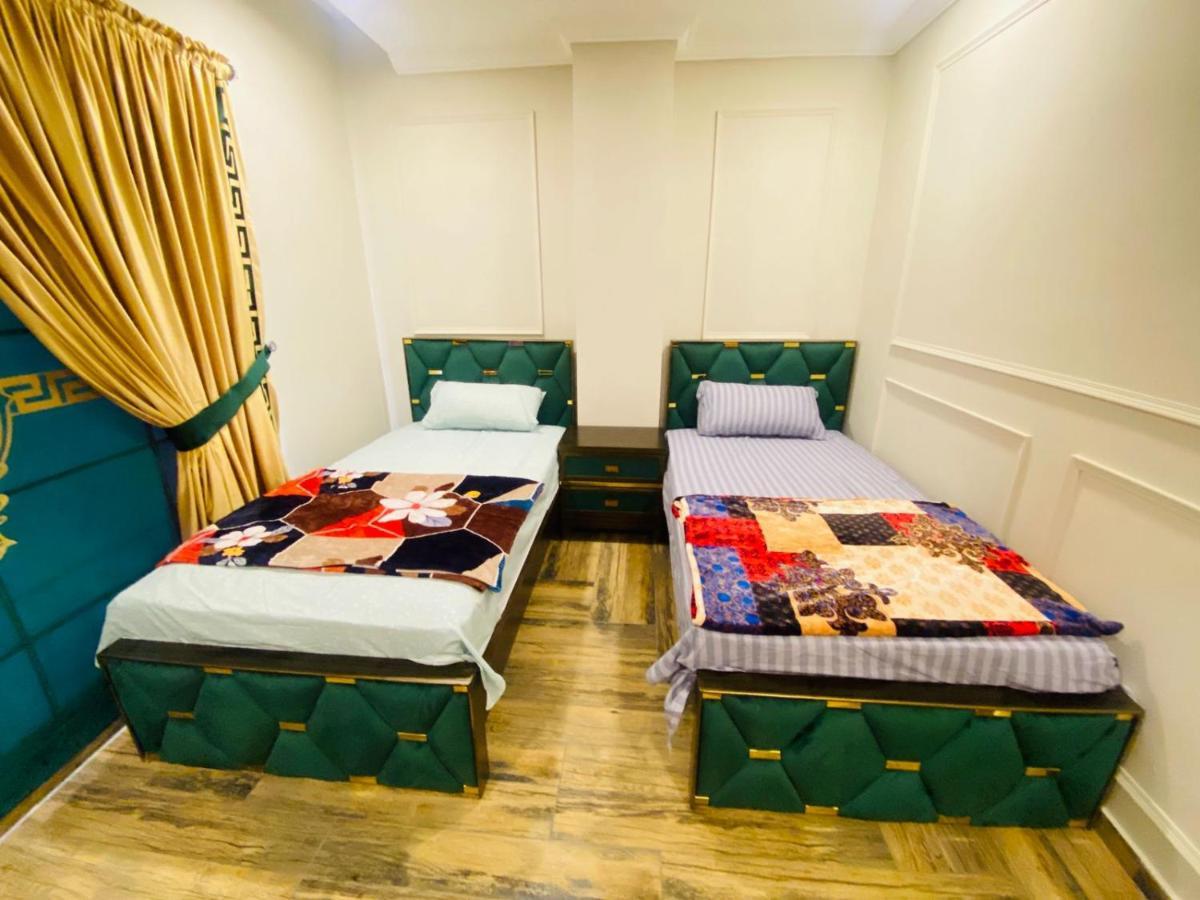 Holidazzle Serviced Apartments Bahria Town ラーワルピンディー エクステリア 写真